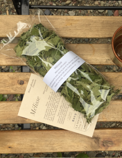 sachet of dried lemon balm (Melissa officinalis), with a sachet of organic lemon balm seeds (Melissa officinalis)